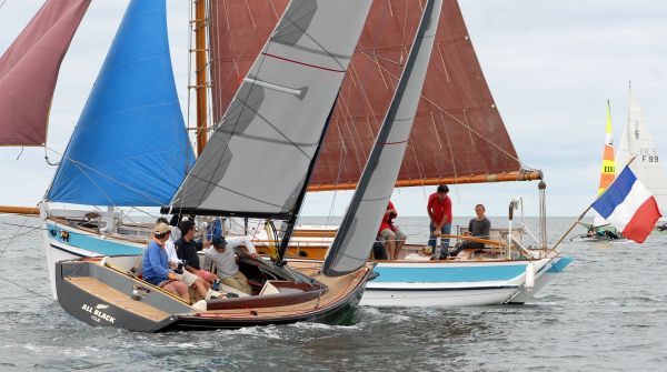 Tofinou 8.0 m passing classic vessel.jpg